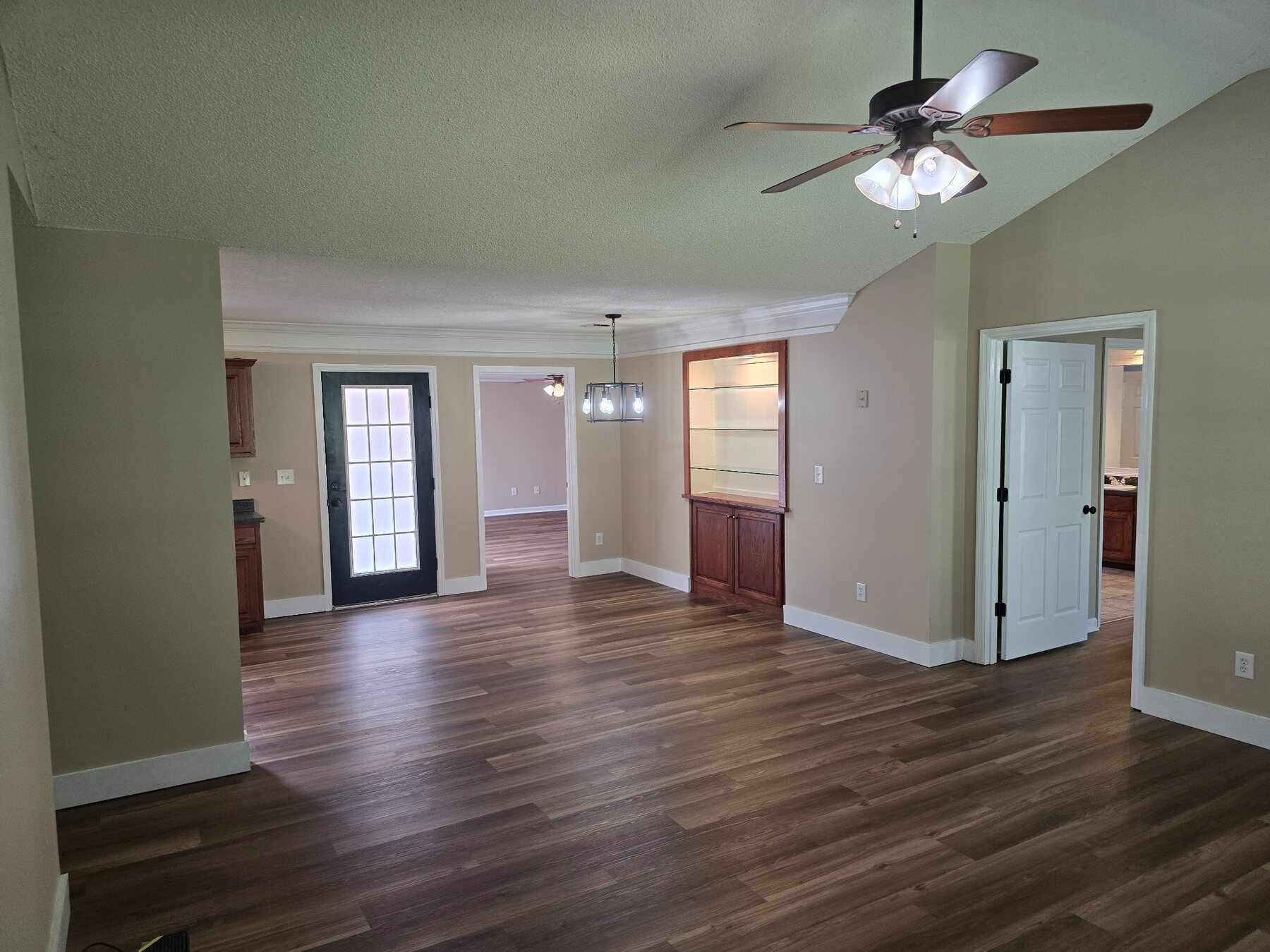 Open living and dining space viewed from the kitchen