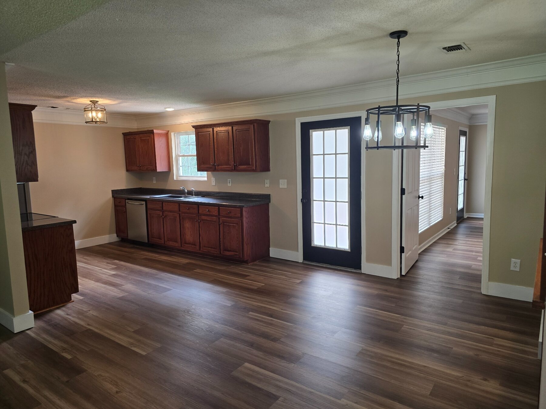 Kitchen and dining area with French-style exterior door