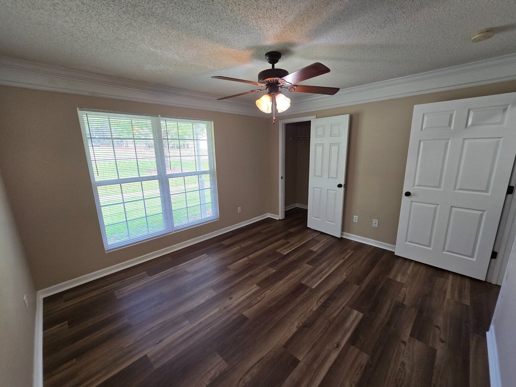 Alternate view of bedroom with double-door closet